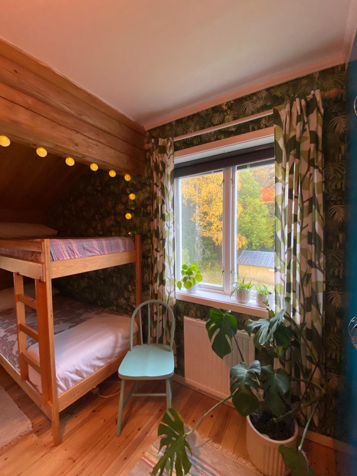 Warm shared accommodation room at the retreat house